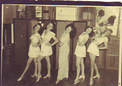 Gloria Norman (center) with her dance students at the Norman Studios. 