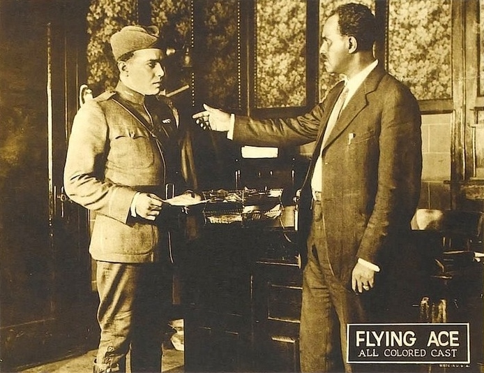 Laurence Criner (left) with R.L. Brown in a scene from "The Flying Ace."